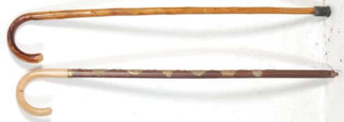 TWO TWENTIETH CENTURY VINTAGE WALKING STICKS