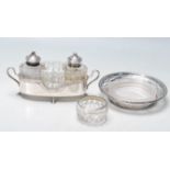 20TH CENTURY SILVER HALLMARKED JAM DISH ALONG WITH CRUET SET WITH SILVER TOP.