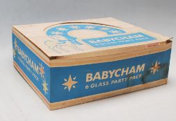 A SET OF SIX VINTAGE RETRO BABYCHAM GLASSES