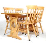 LATE 20TH CENTURY LIGHT OAK DINING TABLE AND CHAIRS.