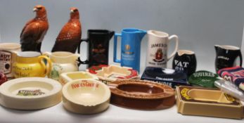 GOOD COLLECTION OF PUB BREWERIANA JUGS ASHTRAYS WHISKEY DECANTERS AND MORE