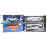 COLLECTION OF BBURAGO & MAISTO 1/18 SCALE BOXED DIECAST