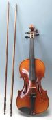 An antique early 20th Century 3/4 size violin by N