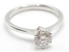 A STAMPED 18CT WHITE GOLD SINGLE STONE DIAMOND RIN