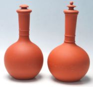 TWO POMPE TERRACOTTA LIDDED VESSELS