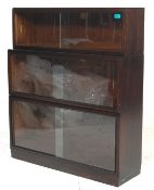 A VINTAGE MAHOGANY SIMPLEX LAWYERS BOOKCASE.