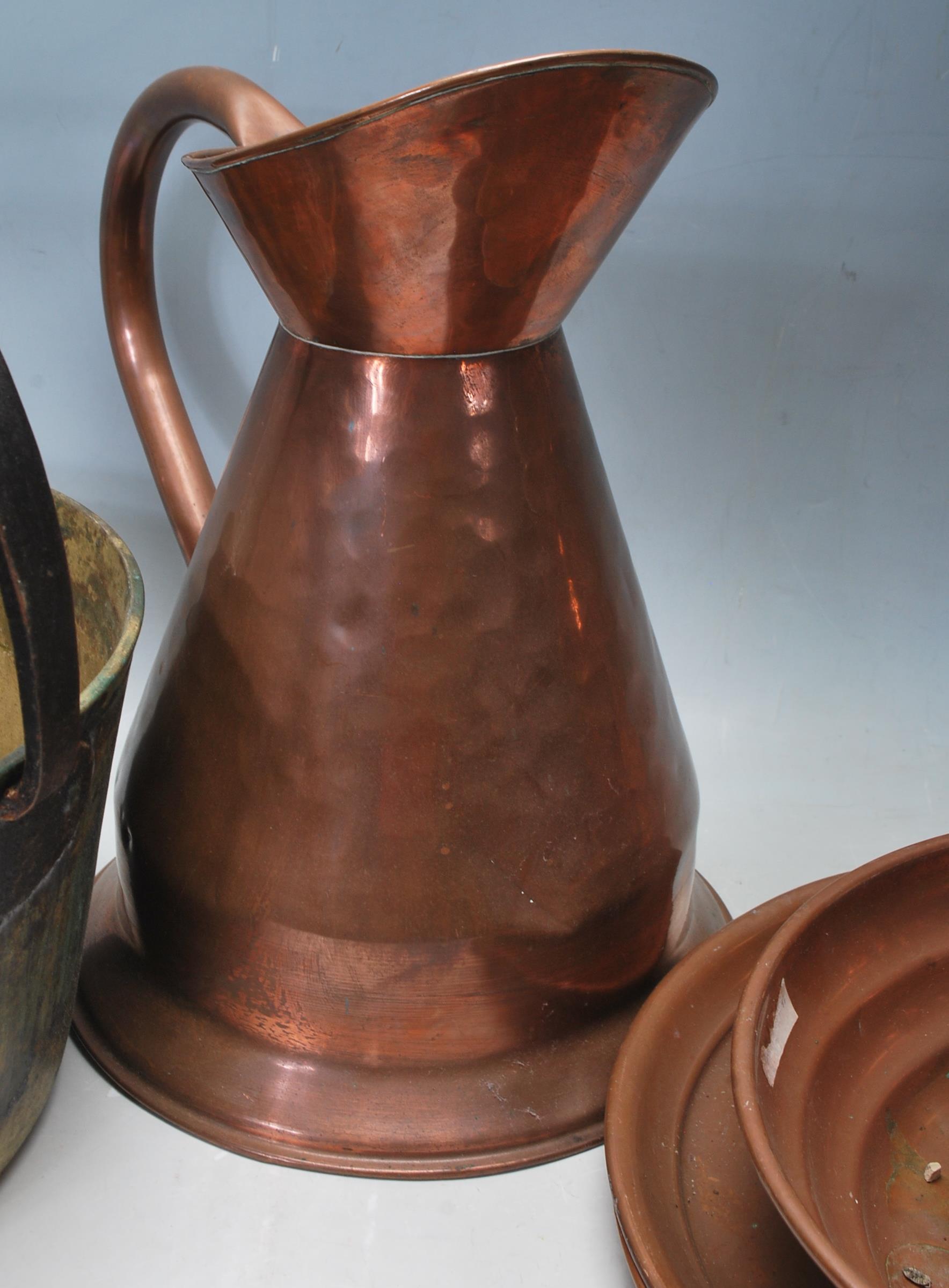 A quantity of early 20th century copper vessels an - Image 5 of 7