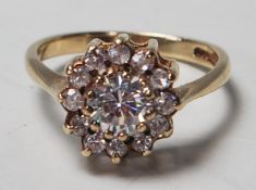 A hallmarked 9ct gold white stone cluster ring bei