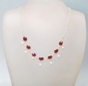 A STAMPED 925 SILVER GARNET AND FRESHWATER PEARL N