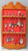 COLLECTION OF COMMEMORATIVE SPOONS & WALL DISPLAY