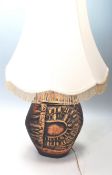 A VINTAGE TREMAEN POTTERY DESK LAMP.