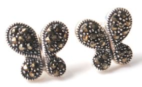 A pair of silver and marcasite earrings in the for