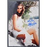 FROM THE COLLECTION OF VALERIE LEON - SIGNED PHOTOGRAPH