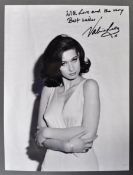 FROM THE COLLECTION OF VALERIE LEON - SIGNED B/W P