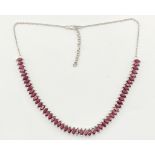 A HALLMARKED 925 SILVER AND MADAGASCAN RUBY NECKLACE.