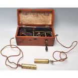 AN ANTIQUE VICTORIAN PATENT MAGNETO ELECTRIC MACHINE FOR NERVOUS DISEASES IN ORIGNAL MAHOGANY CASE.