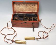 AN ANTIQUE VICTORIAN PATENT MAGNETO ELECTRIC MACHINE FOR NERVOUS DISEASES IN ORIGNAL MAHOGANY CASE.