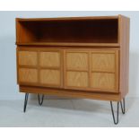 A VINTAGE 1970’S TEAK WOOD SIDEBOARD BY NATHAN ON HAIRPIN LEGS