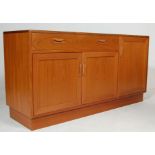 TEAK WOOD G-PLAN SIDEBOARD RAISED ON A PLINTH BASE