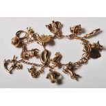 VINTAGE 9CT GOLD CHARM BRACELET