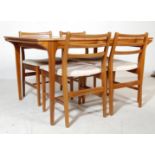 RETRO 1970’S DANISH INSPIRED TEAK WOOD EXTENDING DINING TABLE AND FOUR TEAK WOOD CHAIRS