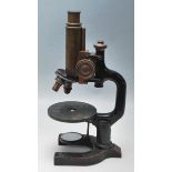 AN EARLY 20TH CENTURY EDWARDIAN VINTAGE BRASS AND EBONISED METAL AUSTRIAN MADE MICROSCOPE