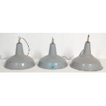 A SET OF THREE VINTAGE FACTORY INDUSTRIAL PENDANT LIGHTS