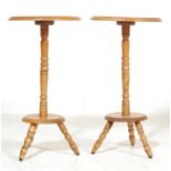 A PAIR OF OAK SIDE TABLES / PLANT STAND WITH CIRCULAR TOPS