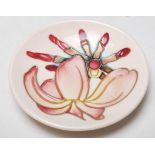 A VINTAGE 20TH CENTURY MOORCROFT PIN DISH WITH PINK FLORAL DECORATION