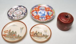 JAPANESE CERAMIC PLATES AND SAUCERS