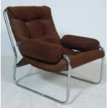 A VINTAGE RETRO 20TH CENTURY TUBULAR FRAME ARMCHAIR