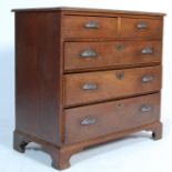 A 19TH CENTURY GEORGIAN OAK CHEST OF DRAWERS - TWO OVER THREE CONFIGURATION