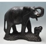 A 20TH CENTURY AFRICAN TRIBAL STATUE FIGURINE OF AN ELEPHANT