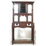 A VICTORIAN JACOBEAN OAK HALL STAND COAT STAND