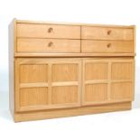 A RETRO 1970’S TEAK WOOD SIDEBOARD WITH FOUR DRAWERS AND A CUPBOARD