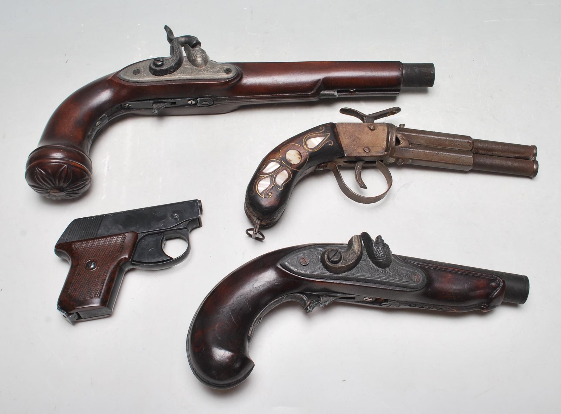 COLLECTION OF FOUR ANTIQUE STYLE LATE 20TH GUNS