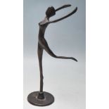 AN 20TH CENTURY BRONZE ART DECO STYLE ABSTRACT DANCING FIGURINE