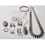 A COLLECTION OF 925 SILVER JEWELLERY - NECKLACES - PENDANTS - BRACELETS