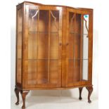AN ANTIQUE 1930’S WALNUT CHINA DISPLAY CABINET RAISED ON QUEEN ANNE SUPPORTS