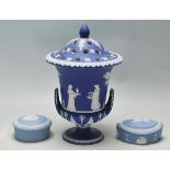 A WEDGWOOD JASPER WARE POT POURRI VASE AND TWO TRINKETS BOXES