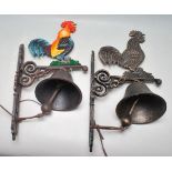 TWO VINTAGE STYLE CAST IRON BELLS BOTH HAVING A COCKEREL IN PROFILE