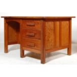 A RETRO MID 20TH CENTURY AIR MINISTRY STYLE OAK DESK