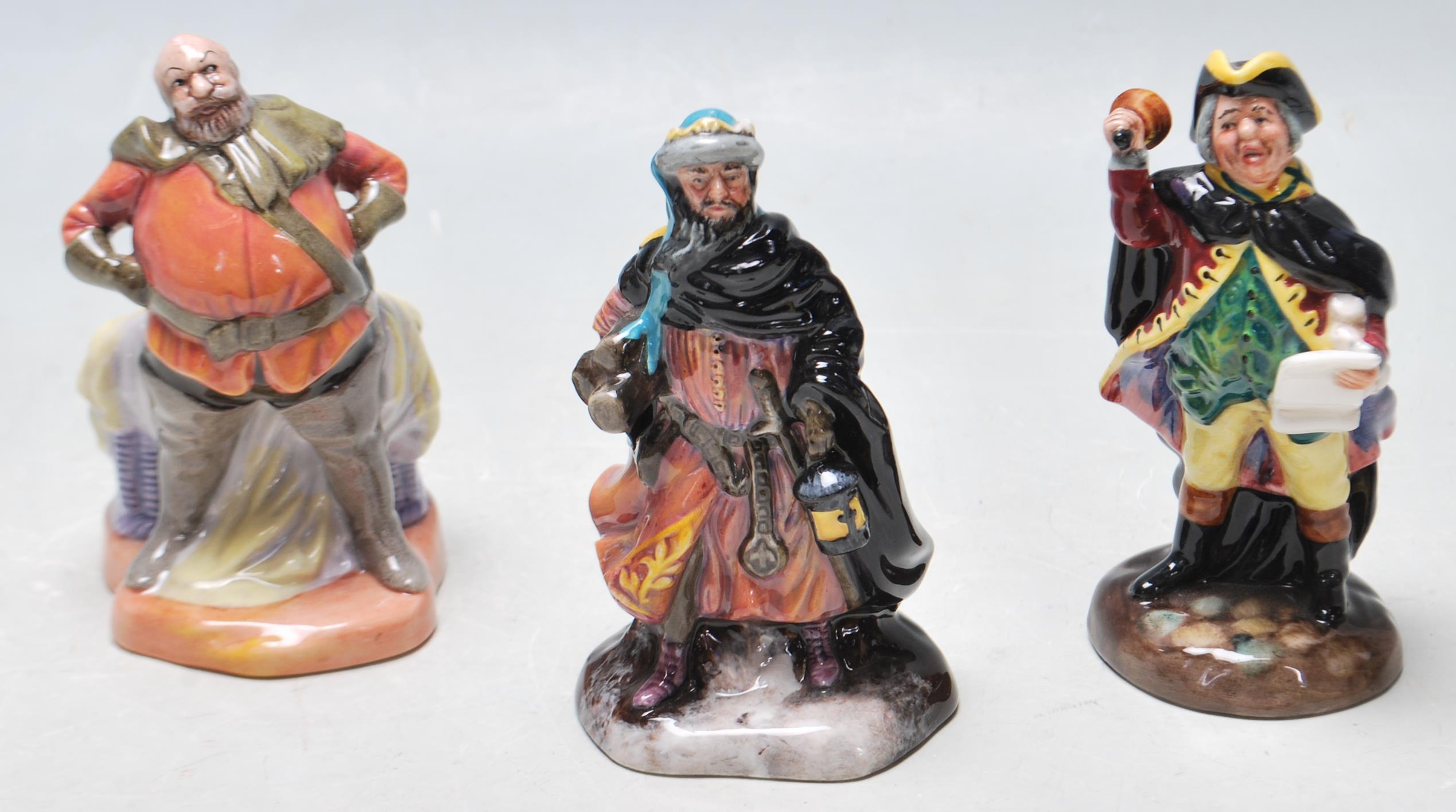 GROUP OF THREE ROYAL DOULTON CERAMIC FIGURINES - GOOD KING WENCESLAS - TOWN CRIER - FALSTAFF