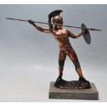 A LATE 20TH CENTURY BRONZE EFFECT FIGURINE OF A ROMAN GLADIATOR