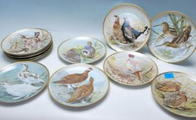 A COMPLETE SET OF 12 FRANKLIN PORCELAIN GAMEBIRDS OF THE WORLD BY BASIL EDE COLLECTOR PLATES