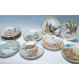 A COMPLETE SET OF 12 FRANKLIN PORCELAIN GAMEBIRDS OF THE WORLD BY BASIL EDE COLLECTOR PLATES