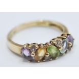 STAMPED 9CT GOLD LADIES RING WITH COLOURED STONES