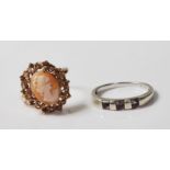 TWO 9CT GOLD RINGS. CAMEO RING - WHITE GOLD RING.
