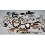 A LARGE QUANTITY OF VINTAGE COSTUME JEWELLERY - NECKLACES - BRACELETS - EARRINGS
