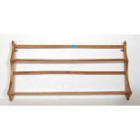 A RETRO 20TH ERCOL BEECH AND ELM BOOK SHELVE / PLATE RACK